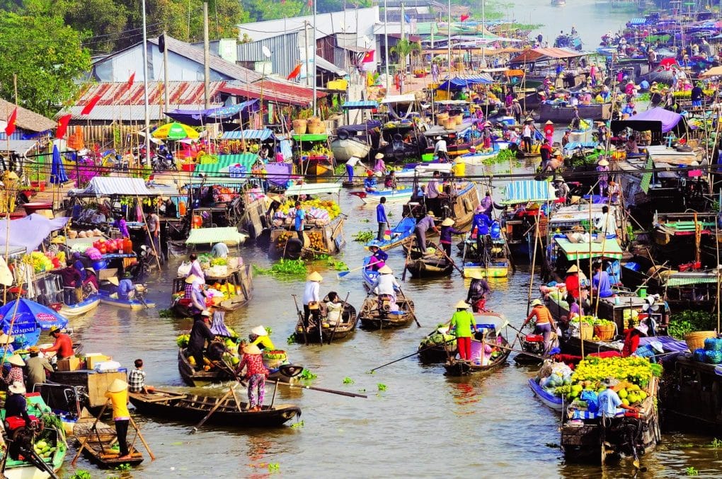 floating market on mekong delta 2 1024x680 - When to avoid riding motorbikes to Mekong Delta in Vietnam?